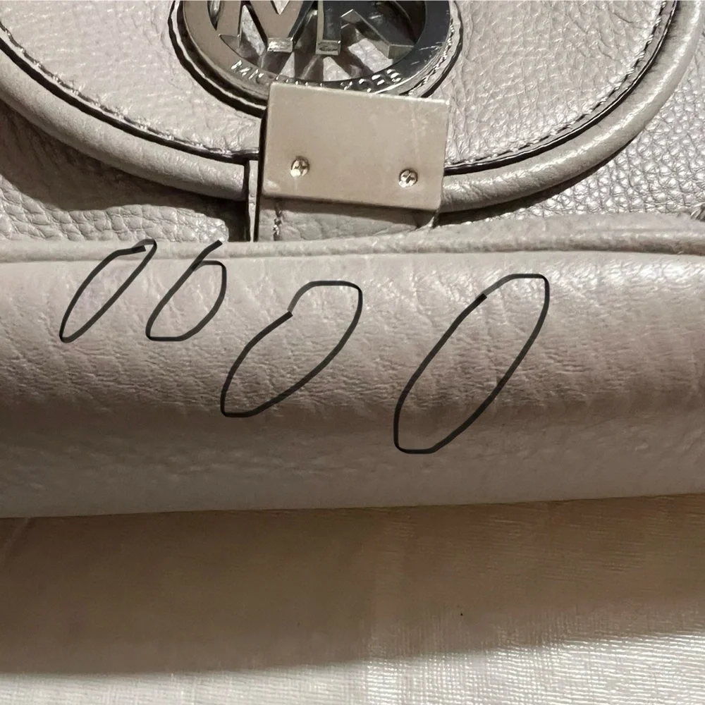Michael Kors hobo handbag with silver color hardware